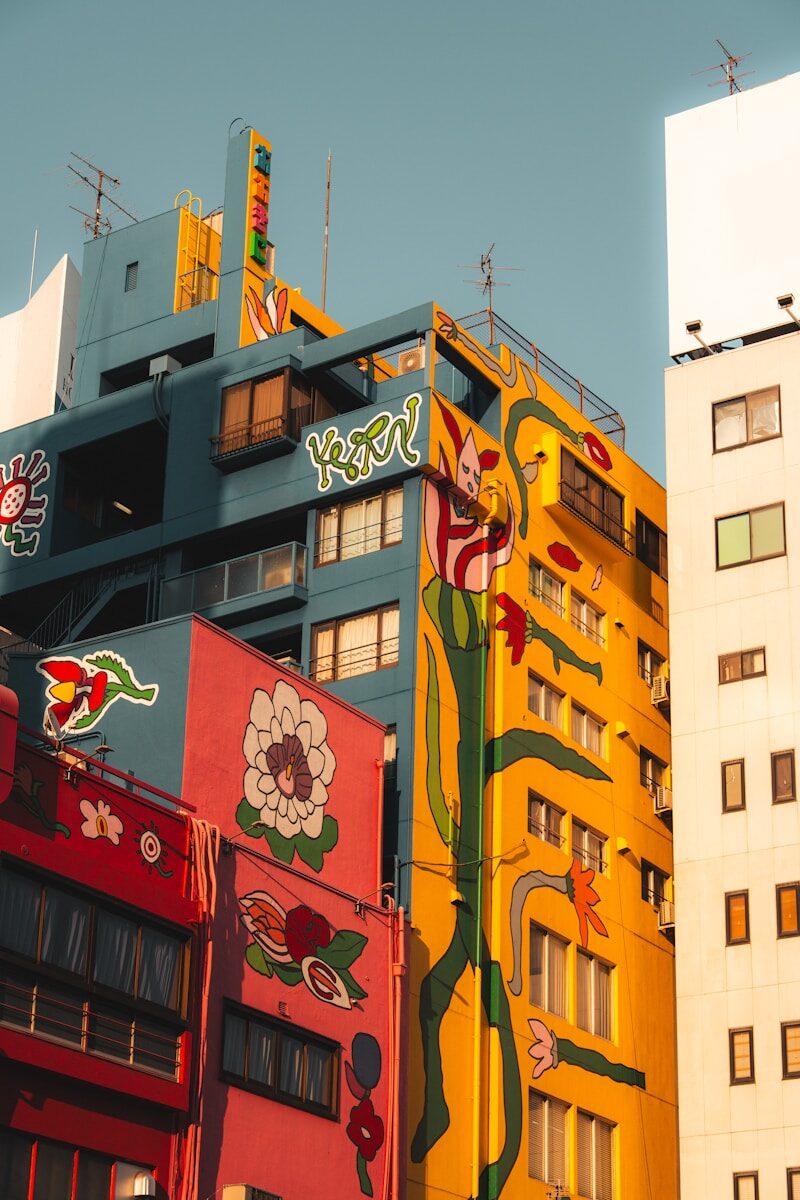 Vibrant, artistic buildings with colorful murals.